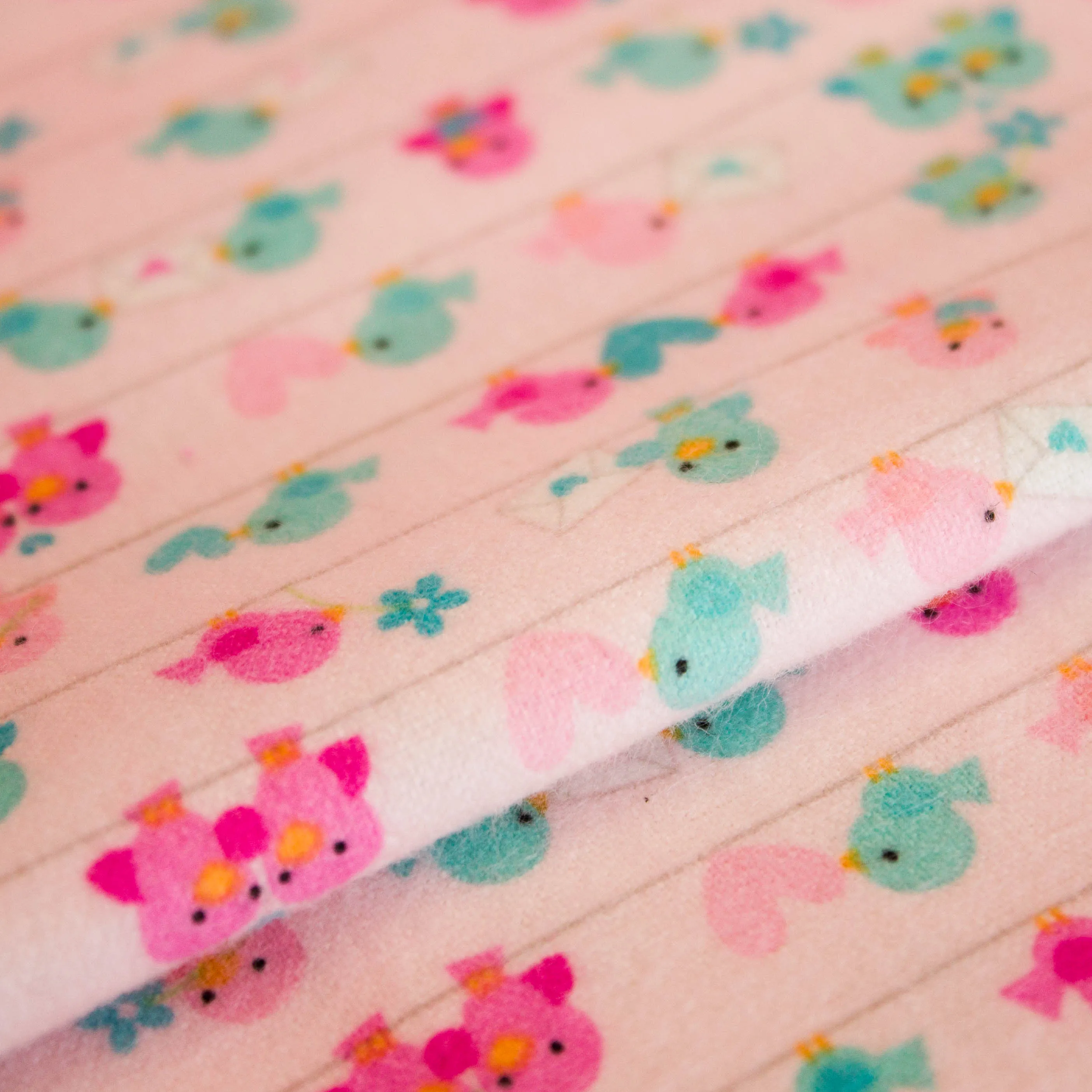 Flanel roze met roze / blauwe vogels
